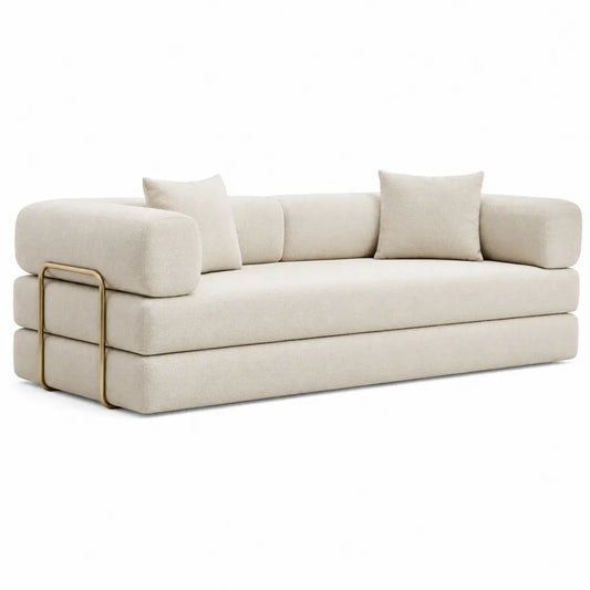 Sofá de tela beige con estructura metálica